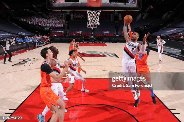 Damian Lillard of the Portland Trail Blazers drives to the basket against the Oklahoma City Thunder on January 25, 2021 at the Moda Center Arena in...