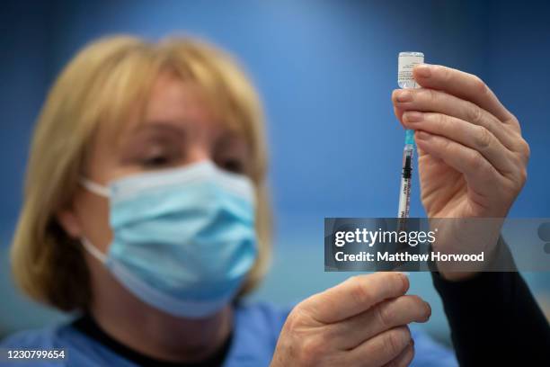 The Pfizer-BioNTech vaccine is prepared at Cwmbran Stadium on January 26, 2021 in Cwmbran, Wales. Wales is on track to vaccinate nearly three...