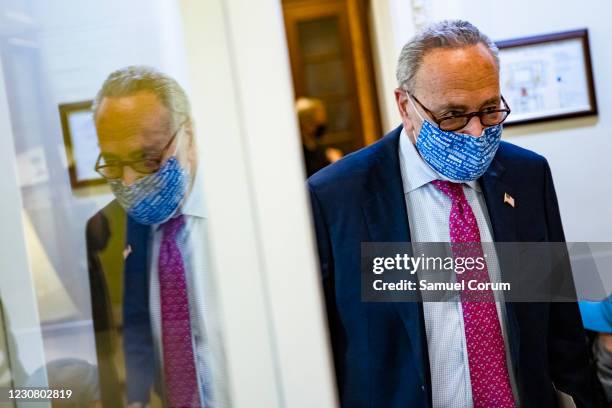 Senate Majority Leader Chuck Schumer heads to a press conference in the Capitol building on January 26, 2021 in Washington, DC. Today senators will...