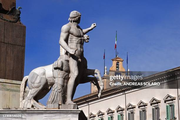 This photograph shows a statue in front of the Quirinale Presidential Palace in central Rome on January 27, 2021.