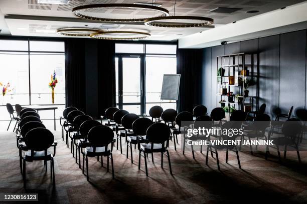 Picture shows an empty meeting room in the Van der Valk hotel in Enschede on January 27 amid the Covid-19 pandemic. - The hotel company fears that...