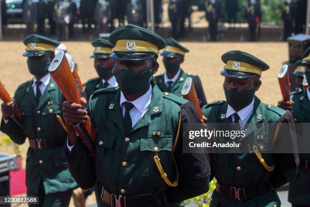 Zimbabwean ceremonial soldiers are seen during the funeral ceremony at the Acre National Heroes cemetery in Harare, Zimbabwe on January 27, 2021. The...