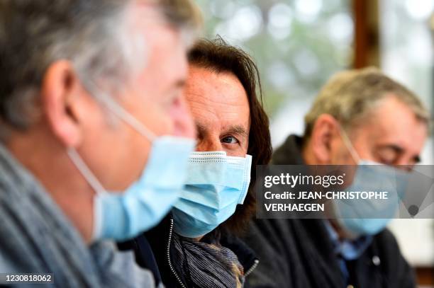 Three friends of Michel Platini Michel Keff, Frederic Bragard and Gerard Keff, speak in a meeting room of the sport complex Aldo Platini in Joeuf,...