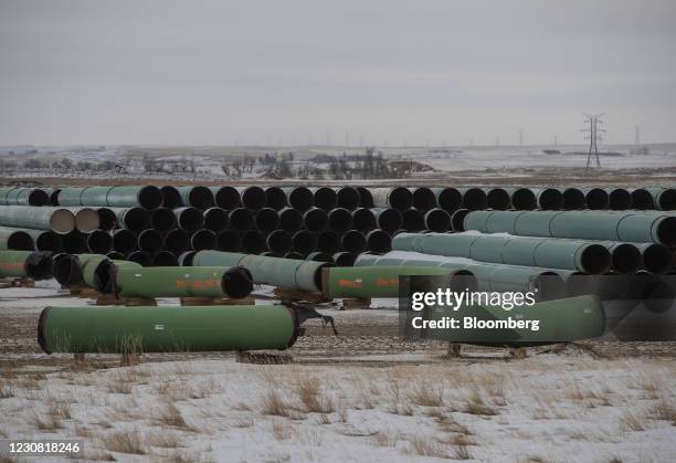 Pipes for the Keystone XL pipeline stacked in a yard near Oyen, Alberta, Canada, on Tuesday, Jan. 26, 2021. U.S. President Joe Biden revoked the...