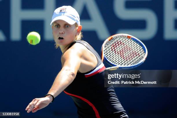 Jelena Dokic of Australia returns a shot against Olga Govortsova of Belarus during Day Two of the 2011 US Open at the USTA Billie Jean King National...