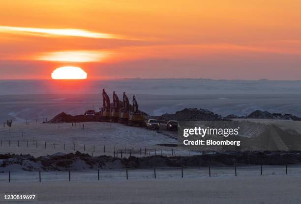 Crews work on a right of way for the Keystone XL pipeline near Oyen, Alberta, Canada, on Wednesday, Jan. 27, 2021. U.S. President Joe Biden...