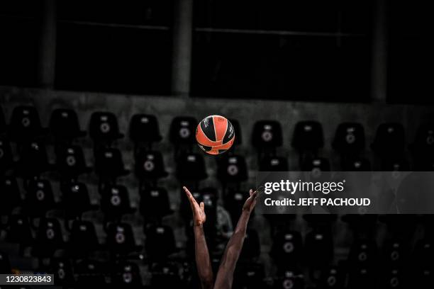 Lyon-Villeurbanne and TD Systems Baskonia Vitoria-Gasteiz 's players fight for the ball during the Euroleague basket ball match between ASVEL...