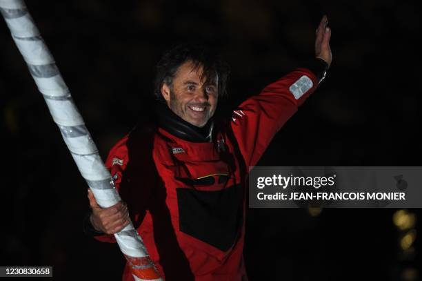 France's Yannick Bestaven celebrates after crossing the finish line of the 2020/2021 edition of the Vendee Globe round-the-world monohull solo...