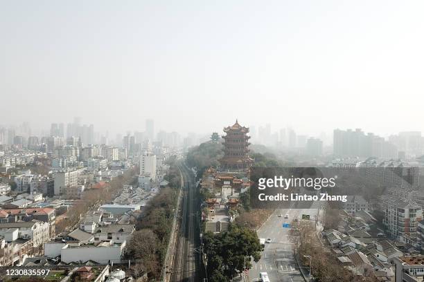 An aerial view of the Yellow Crane Tower on January 28, 2021 in Wuhan, China. In order to curb the spread of the new crown pneumonia COVID-19...