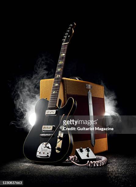 Custom Fender-style hybrid electric guitar built from a 1960s Epiphone Crestwood Custom, DeArmond Model 2000 pickups and a Fender Jaguar vibrato,...