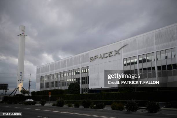 Falcon 9 rocket is displayed outside the Space Exploration Technologies Corp. Headquarters on January 28, 2021 in Hawthorne, California.