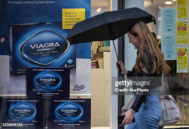 People walking by Viagra Connect ad seen in The Boots Pharmacy window in Dublin during Level 5 Covid-19 lockdown. On Thursday, 28 January in Dublin,...