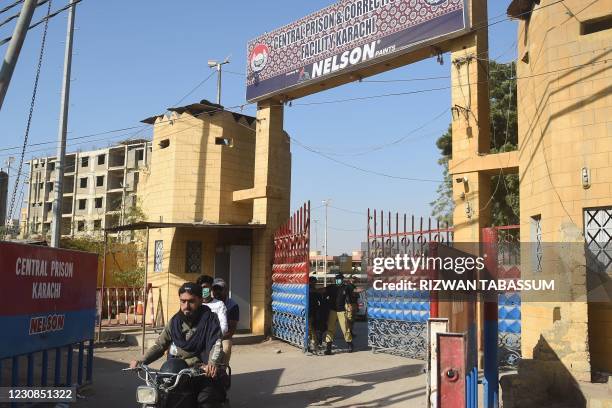 Policeman colses the door of the central prison where British-born militant Ahmed Omar Saeed Sheikh, convicted of masterminding the kidnap and murder...