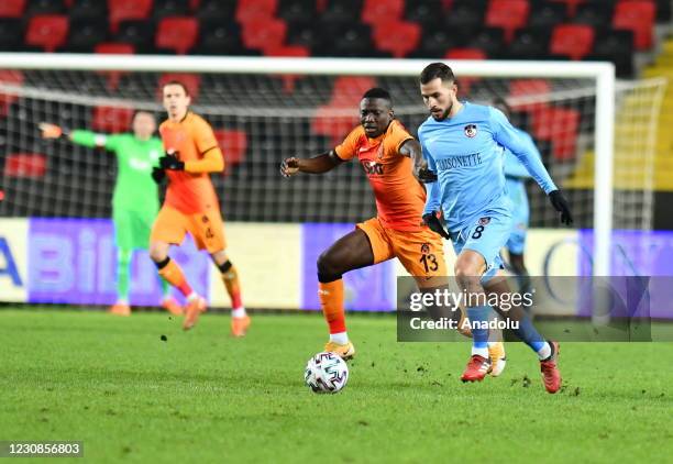 Etebo of Galatasaray in action against Jefferson of Gaziantep FK during Turkish Super Lig match between Gaziantep FK and Galatasaray in Gaziantep,...