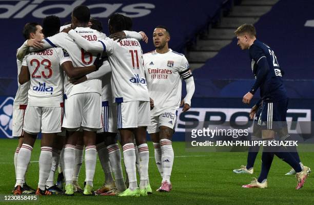 Lyon's players celebrates after scoring during the French L1 football match between Lyon and Girondins de Bordeaux , at the Groupama stadium in...