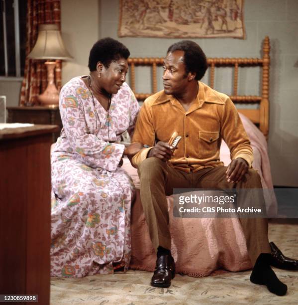 Pictured from left is Esther Rolle , John Amos in the CBS television situation comedy, GOOD TIMES. January 1, 1977.