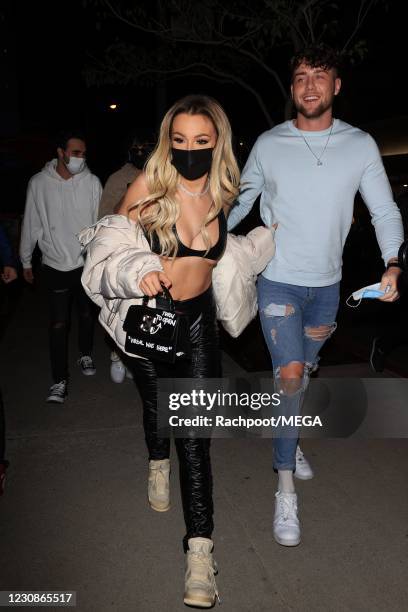 Harry Jowsey and Tana Mongeau enjoy a date night at Boa Steakhouse on January 29, 2021 in Los Angeles, California.