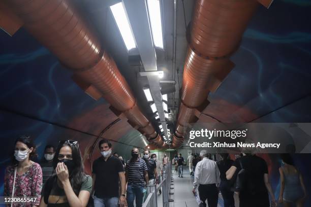 Jan. 29, 2021 -- People wearing face masks are seen at a subway station in Sao Paulo, Brazil, Jan. 28, 2021. Brazil on Thursday reported 61,811 new...