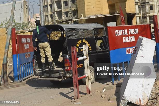 Police vehicle enters the central prison where British-born militant Ahmed Omar Saeed Sheikh, convicted of masterminding the kidnap and murder of US...