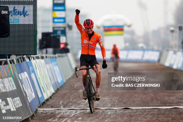Dutch cyclist Pim Ronhaar reacts after winning the men's U23 Cyclo-Cross World Championships, in Ostend on January 30, 2021. / Netherlands OUT /...