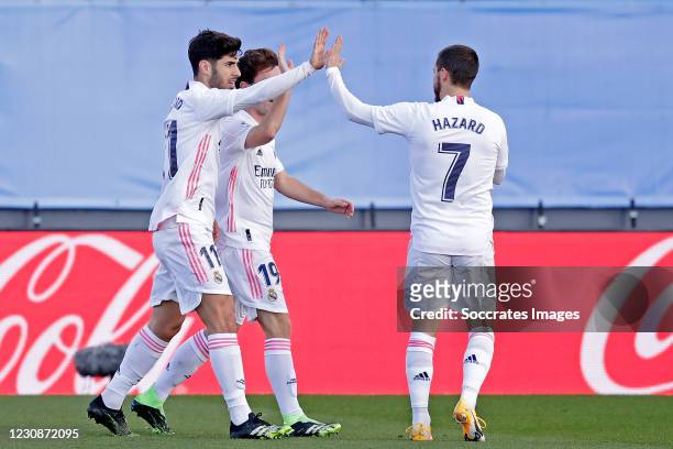 Marco Asensio of Real Madrid celebrates 1-0 with Alvaro Odriozola of Real Madrid, Eden Hazard of Real Madrid during the La Liga Santander match...