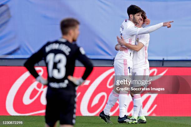 Marco Asensio of Real Madrid celebrates 1-0 with Alvaro Odriozola of Real Madrid during the La Liga Santander match between Real Madrid v Levante at...