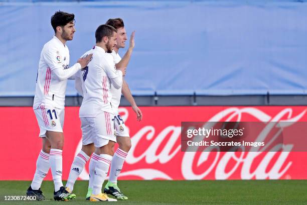 Marco Asensio of Real Madrid celebrates 1-0 with Alvaro Odriozola of Real Madrid, Eden Hazard of Real Madrid during the La Liga Santander match...