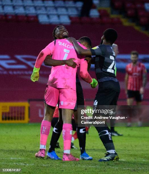 Doncaster Rovers' Ellery Balcombe, centre, celebrates with team-mates Madger Gomes, left, and Cameron John following the Sky Bet League One match...