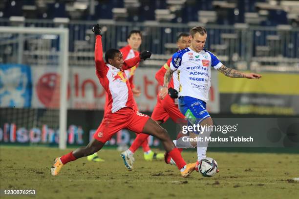 Mohamed Camara of Salzburg and Rajko Rep of Hartberg during the Tipico Bundesliga match between TSV prolactal Hartberg and FC Red Bull Salzburg at...