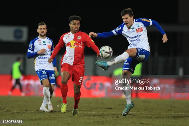 Manfred Gollner of Hartberg, Karim Adeyemi of Salzburg and Juergen Heil of Hartberg during the Tipico Bundesliga match between TSV prolactal Hartberg...