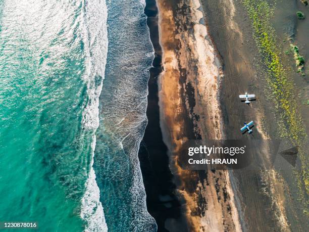 abstract aerial view of a sand beach in iceland - black sand iceland stock pictures, royalty-free photos & images