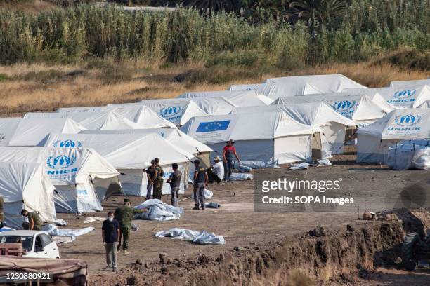 The Greek Army - Hellenic Army is seen building the new refugee camp. The Karatepe, Kara Tepe or Mavrovouni refugee camp was built after the fire in...