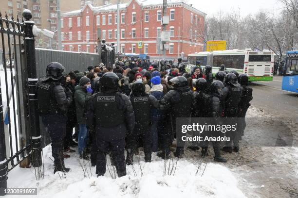 Police intervene in protesters as they gather during an unauthorized rally in support of jailed opposition leader Alexei Navalny in Moscow, Russia on...