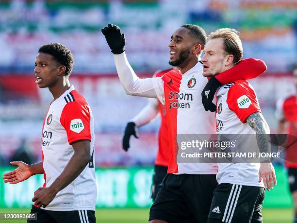 Feyenoord's Dutch defender Tyrell Malacia, Dutch midfielder Leroy Fer and Dutch midfielder Mark Diemers celebrate their 1-0 goal during the Dutch...