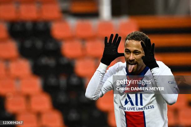 Paris Saint-Germain's Brazilian forward Neymar celebrates after scoring a goal during the French L1 football match between FC Lorient and Paris...