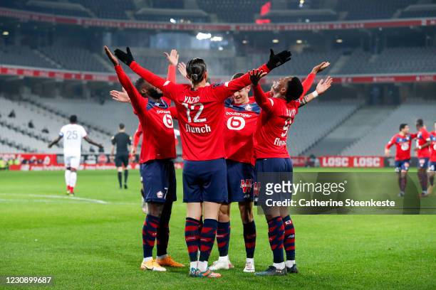 Yusuf Yazici of Lille OSC celebrates his goal with Jonathan Bamba, Domagoj Bradaric and Jonathan Christian David of Lille OSC during the Ligue 1...