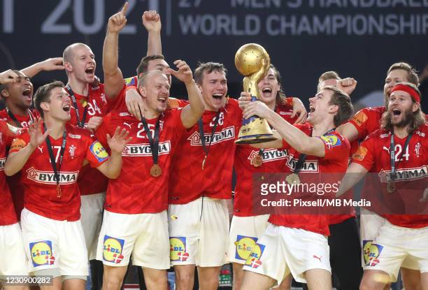 Danish handball team celebrates after winning the 27th IHF Men's World Championship final between Denmark and Sweden at Cairo Stadium Sports Hall on...