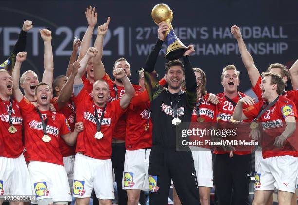 Danish handball team celebrates after winning the 27th IHF Men's World Championship final between Denmark and Sweden at Cairo Stadium Sports Hall on...