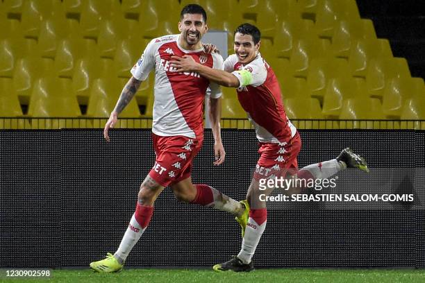 Monaco's Chilean defender Guillermo Maripan celebrates with Monaco's French forward Wissam Ben Yedder after scoring a goal during the French L1...