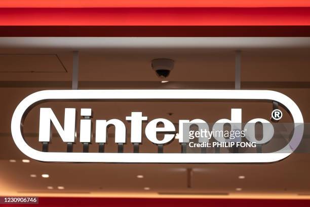 Logo of Nintendo is pictured at its store in Tokyo on February 1, 2021 as the company announced a gain of 2.51 percent.