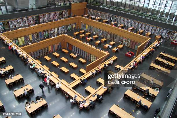 Readers read and study at the National Library of China in Haidian District, Beijing, capital of China, Jan 31, 2021.-