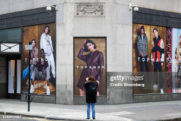 Pedestrian takes a picture outside the closed Topshop store at Oxford Circus in London, U.K., on Monday, Feb. 1, 2021. Asos Plc agreed to buy...