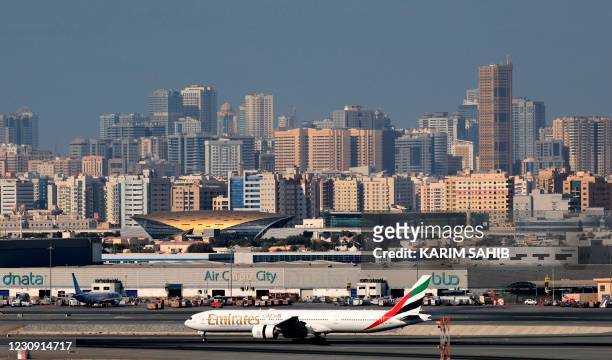 Picture shows an Emirates Airlines aeroplane at Dubai International Airport on February 1, 2021.