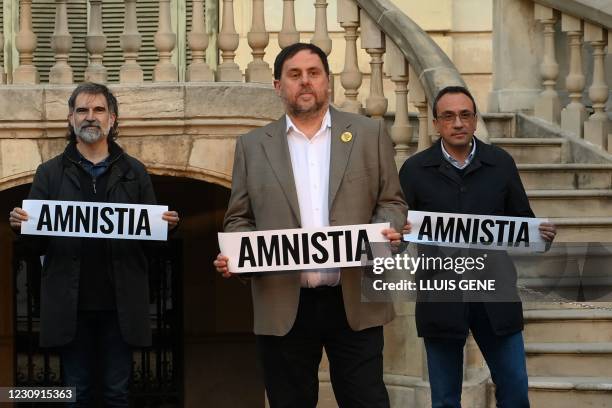 Catalan separatist leaders Jordi Cuixart, Oriol Junqueras and Josep Rull, who have been freed temporarily to participate in the electoral campaign,...