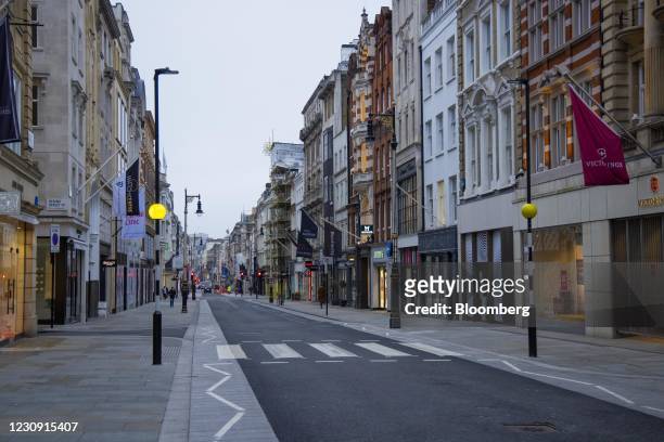 Closed luxury retail stores on Bond Street in central London, U.K., on Monday, Feb. 1, 2021. At least one-fifth of Oxford Street, London's main...