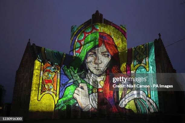 An image of St Brigid projected as part of the Herstory Light Show on St Brigid's Cathedral, Kildare, on St BrigidÕs Day when landmarks across...