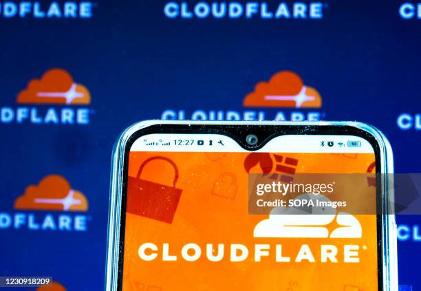 In this photo illustration a Cloudflare Inc. Logo is seen displayed on a smartphone screen.