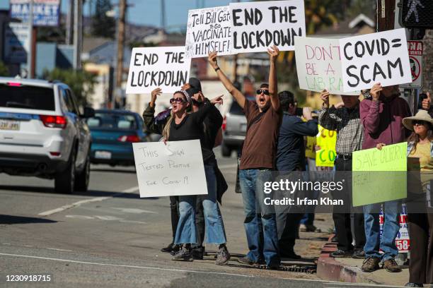 Los Angeles, CA A protest organized by Shop Mask Free Los Angeles rally against COVID vaccine, masks and lockdowns at Dodger Stadium on Saturday,...