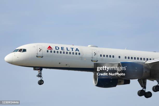 Delta Air Lines Bombardier Boeing 757-200 aircraft as seen arriving, on final approach for landing in New York JFK John F. Kennedy International...
