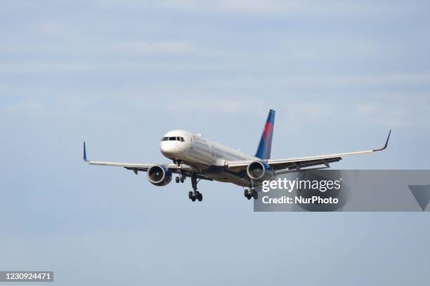 Delta Air Lines Bombardier Boeing 757-200 aircraft as seen arriving, on final approach for landing in New York JFK John F. Kennedy International...